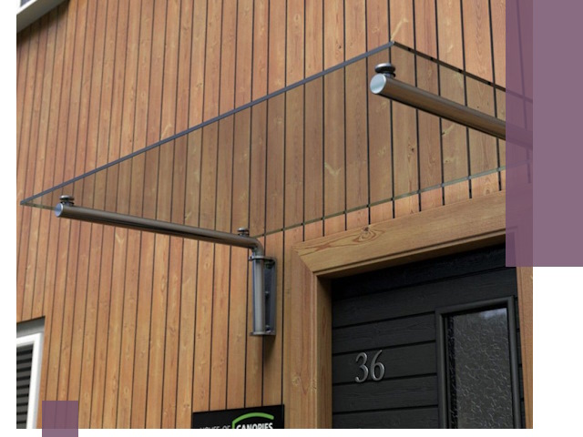 Стеклянные козырьки на входы и фасады в Карпинске